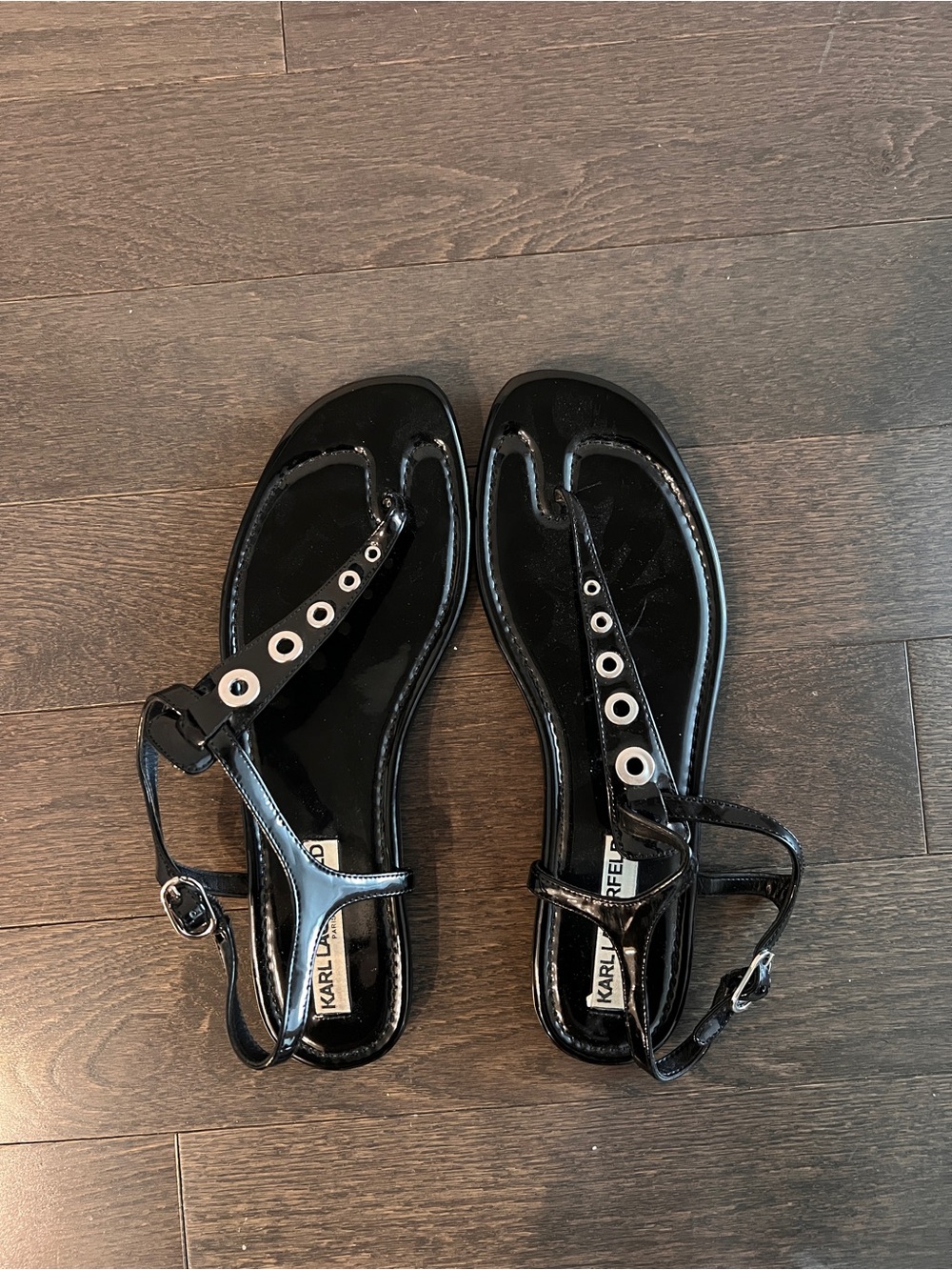 Karl Lagerfeld Black Patent T-Strap Sandals with Silver Eyelet Detail